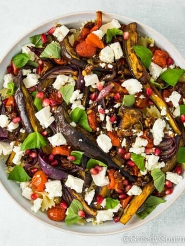 Round bowl of a colorful Roasted vegetable Salad,