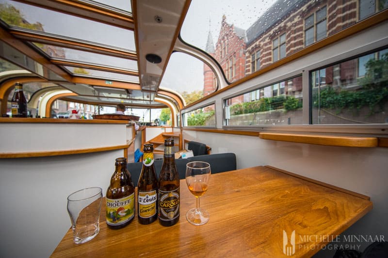 Three beers on a wooden table 