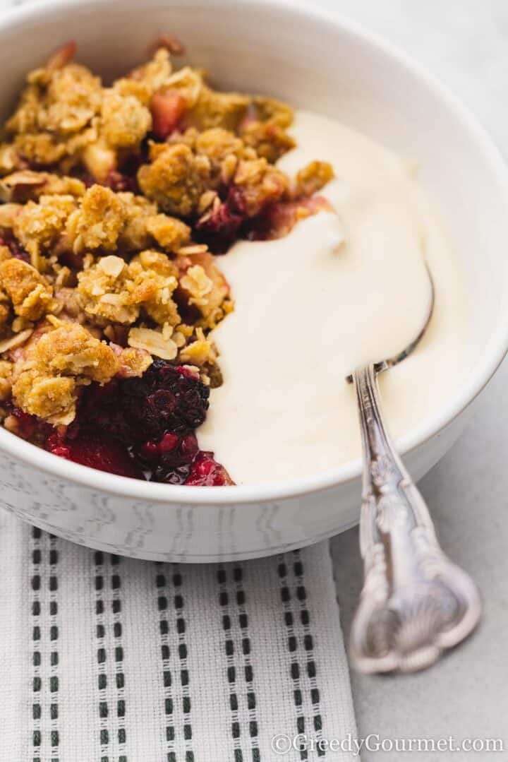 apple and blackberry crumble with yogurt.