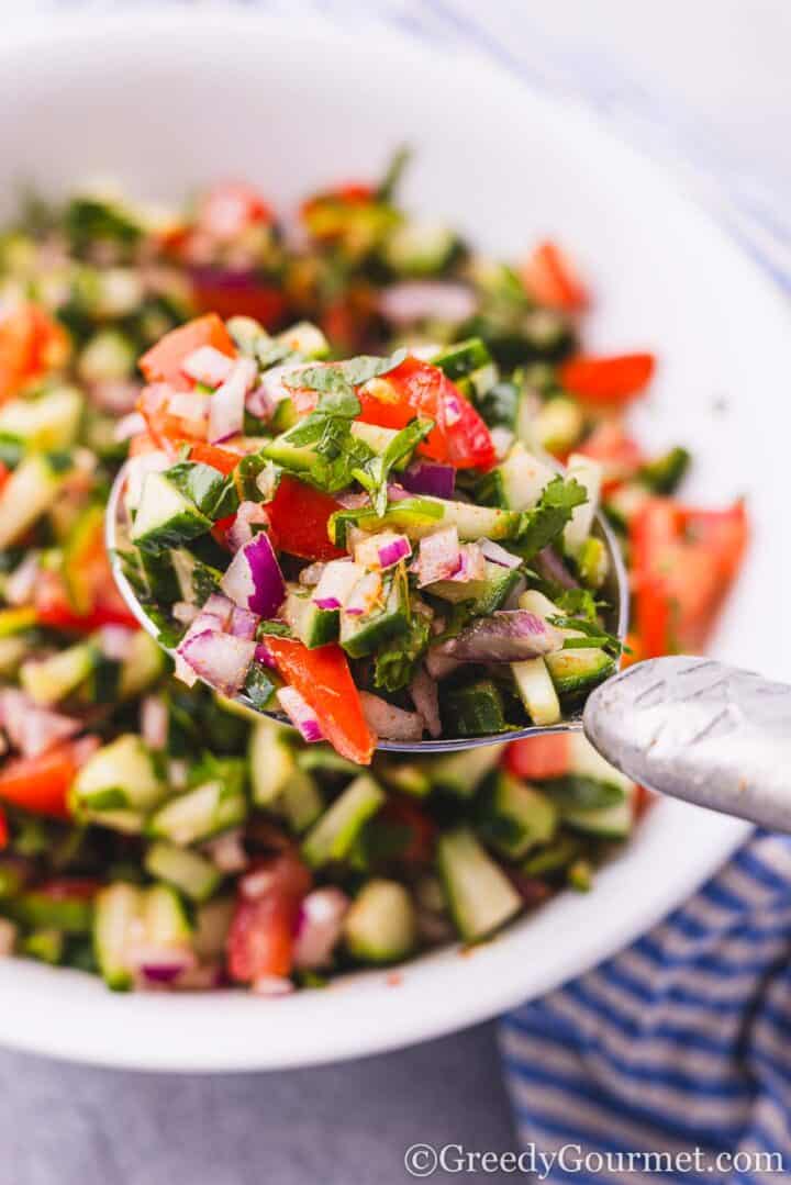 Kachumber Salad in a white bowl.