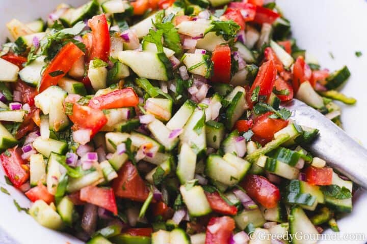 Kachumber Salad in a white bowl.