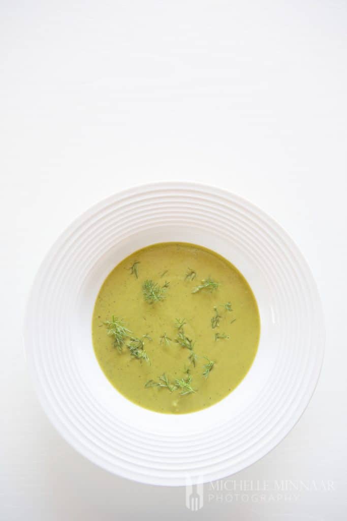 A close up of green soup 