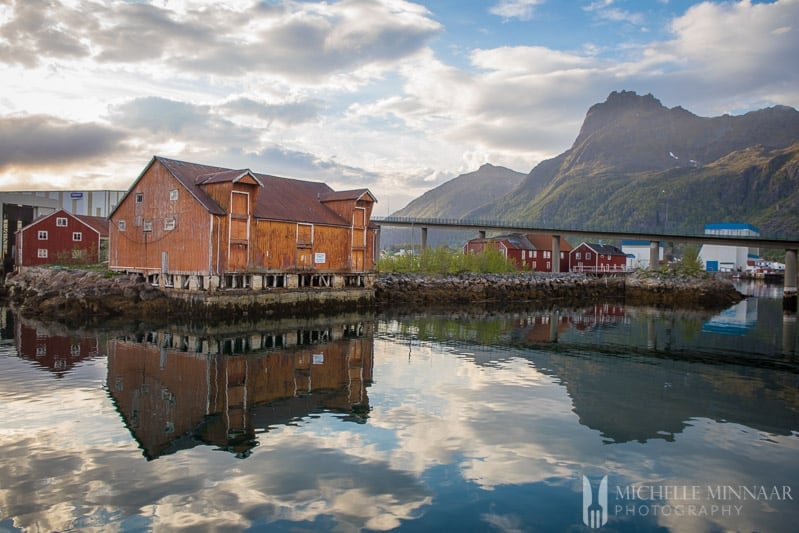 Older brown buildings on the coast of Norway 