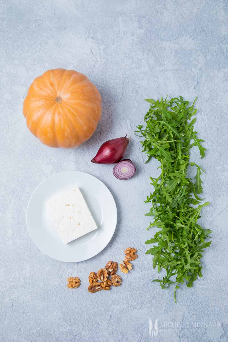 Ingredients to make a pumpkin and feta salad