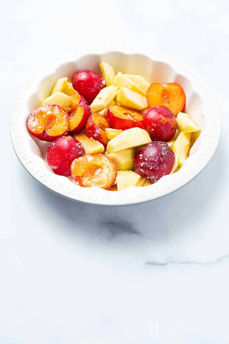 Bowl of cut fresh apples and pears