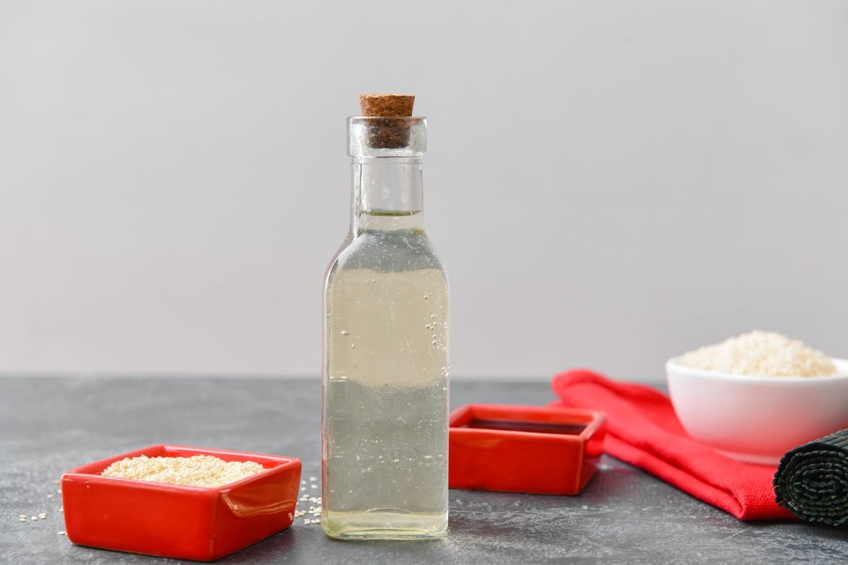 Bottle of rice vinegar to be used as a lemon juice substitute.