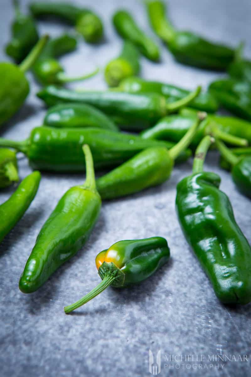 A close up of green peppers