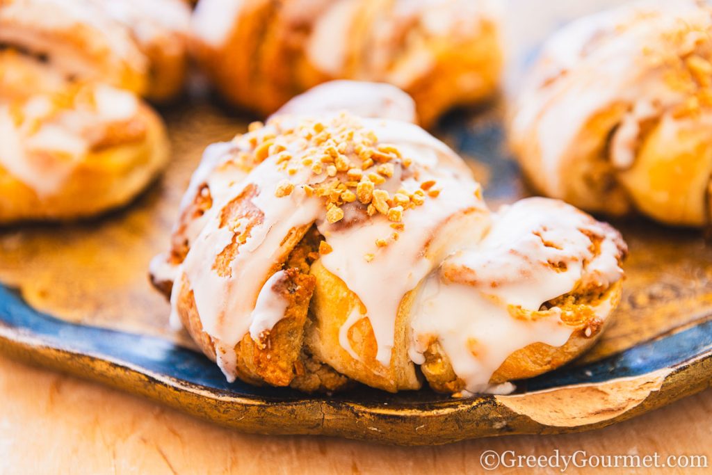 Closeup view of an iced croissant.